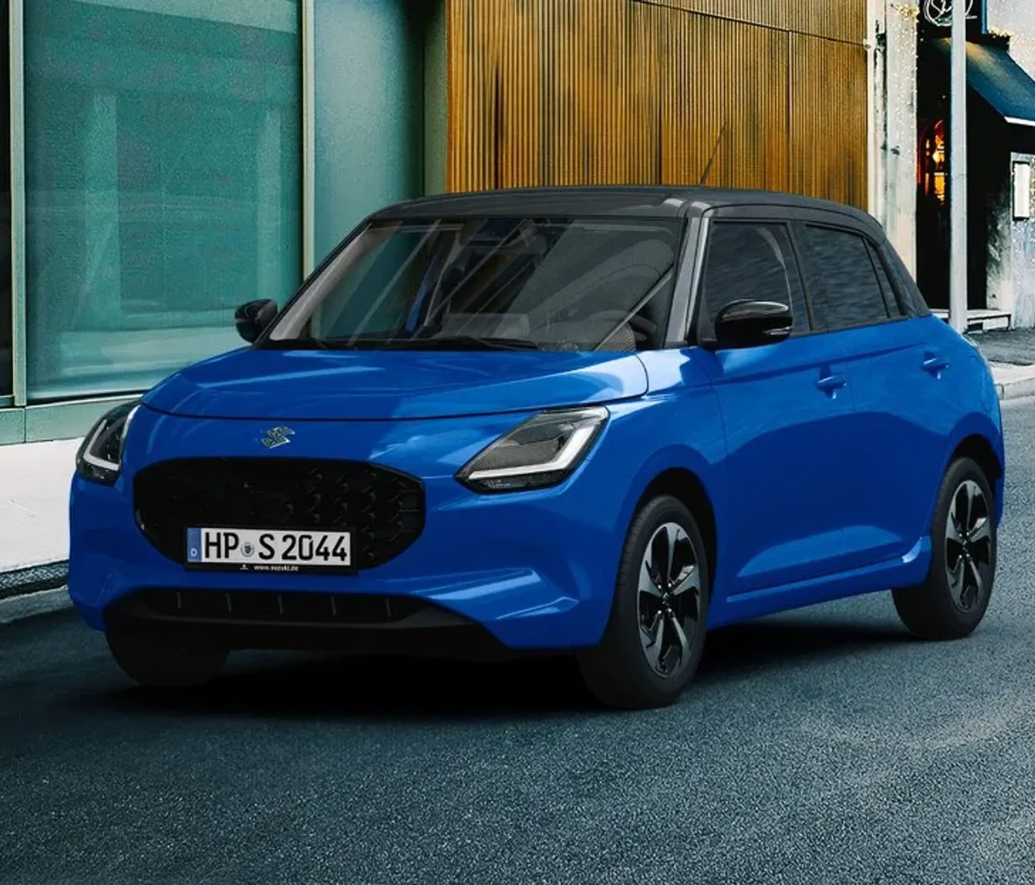 Suzuki swift, 2024 in blau von schräg rechts vor fotografiert